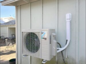 A newly installed Daikin mini-split condenser unit by Breezy Heating and Cooling in Mobile, AL.
