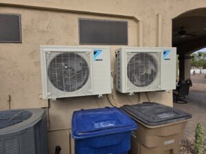 Two Daikin mini-split outdoor units professionally installed by Quantum Cooling & Heating in Mesa, AZ.