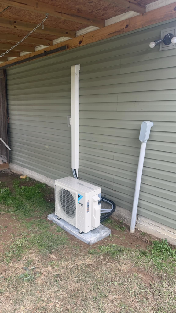 A Daikin mini-split outdoor condenser unit installed by G & N Heating and Cooling in Huntsville, AL.