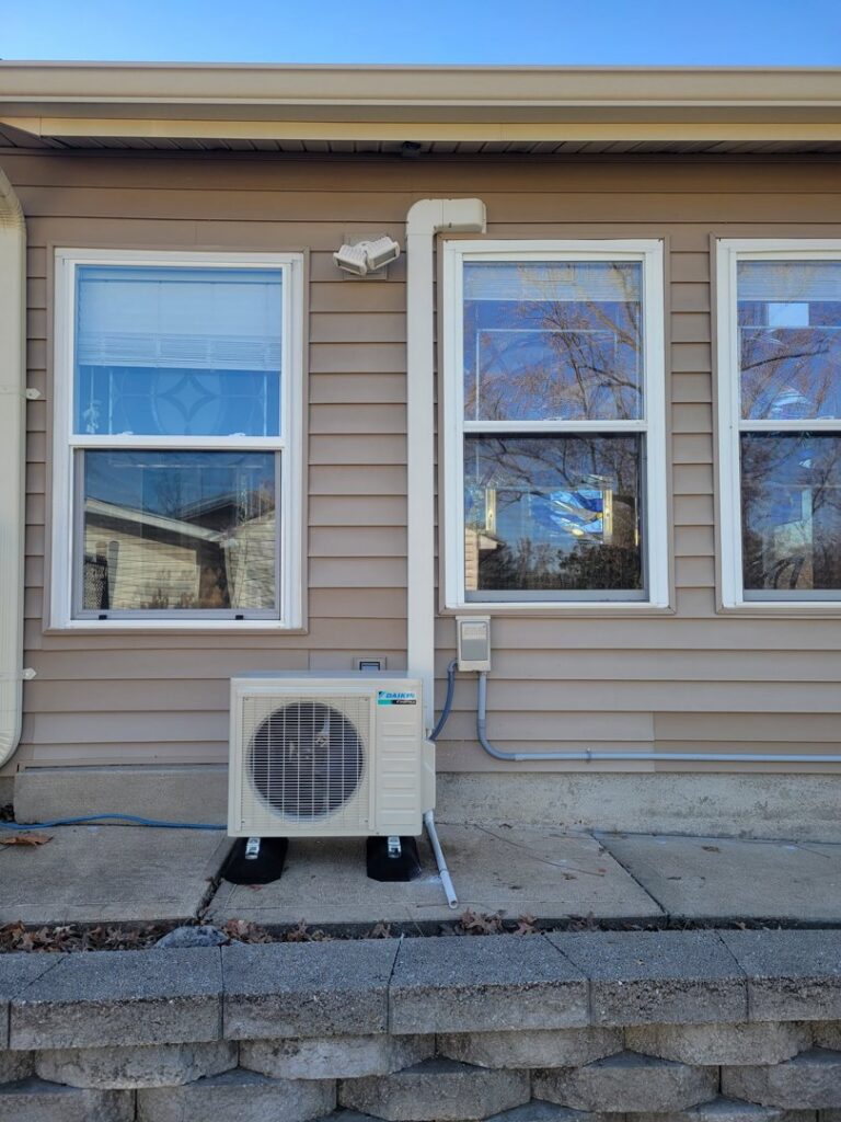 An outdoor Daikin mini-split HVAC unit professionally installed by Integrity Aire in St. Charles, MO.