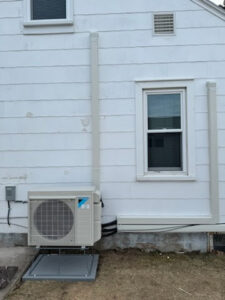 An outdoor Daikin mini-split condenser unit professionally installed by TruTemp Heating & Cooling LLC in Ijamsville, MD.