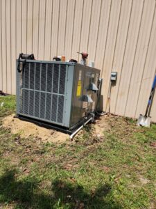 A newly installed Daikin outdoor AC unit next to a building by Krantz Kooling & Heating in West Columbia, SC