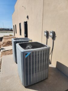 Two Daikin outdoor AC units professionally installed by Norway Air Conditioning Inc. in Laredo, TX.