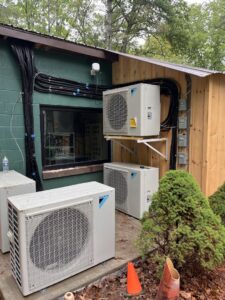 Multiple Daikin outdoor HVAC condenser units installed by Rowan Heating and Air Conditioning, Inc. in Highland, MD
