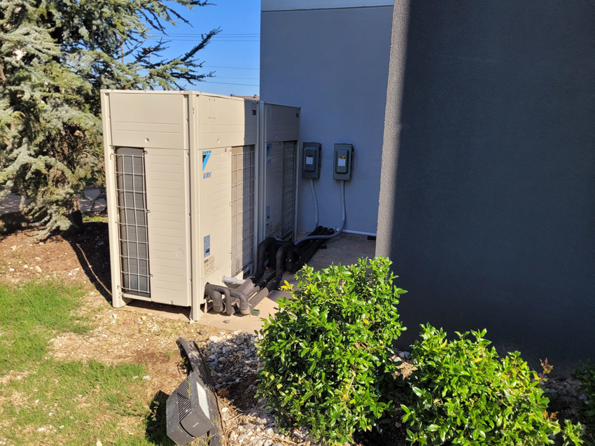 Daikin VRV commercial HVAC systems installed outside a building by SleepRite Heating & Cooling in Conway, AR.
