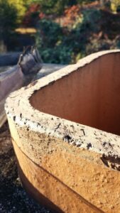 Close-up of a damaged or worn chimney flue liner requiring inspection or repair by Chip's Chimney in Rapid City, SD