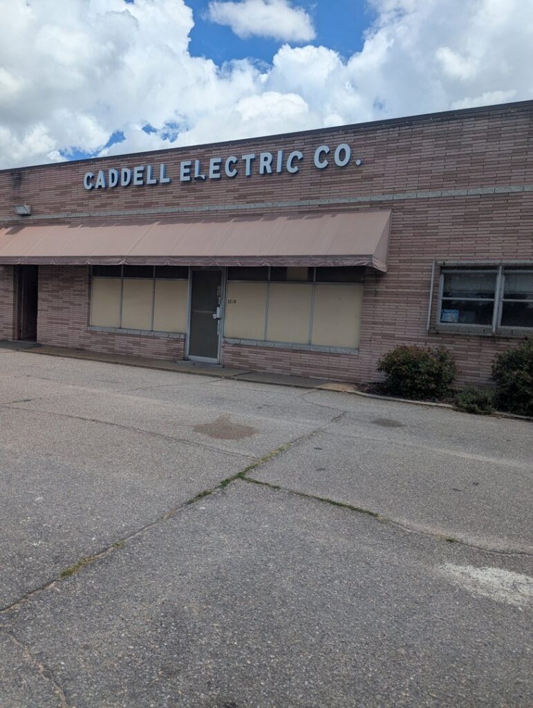 A close-up of damaged or worn electric motor windings being inspected by Caddell Electric Co Inc in Dallas, TX