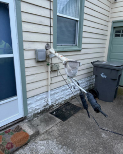 Damaged electrical service entrance and conduit on a house, ready for repair by Zimmerman Electric Indy in Indianapolis, IN
