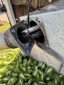 A close-up view of a damaged electrical service entrance requiring repair by York Electric of Westchester in Yonkers, NY.