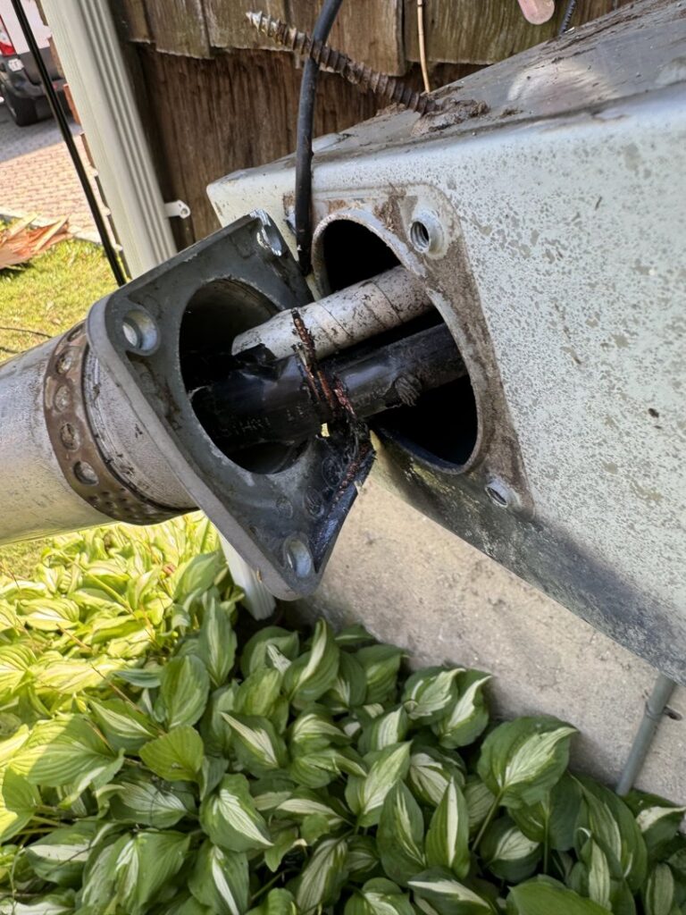A close-up view of a damaged electrical service entrance requiring repair by York Electric of Westchester in Yonkers, NY.