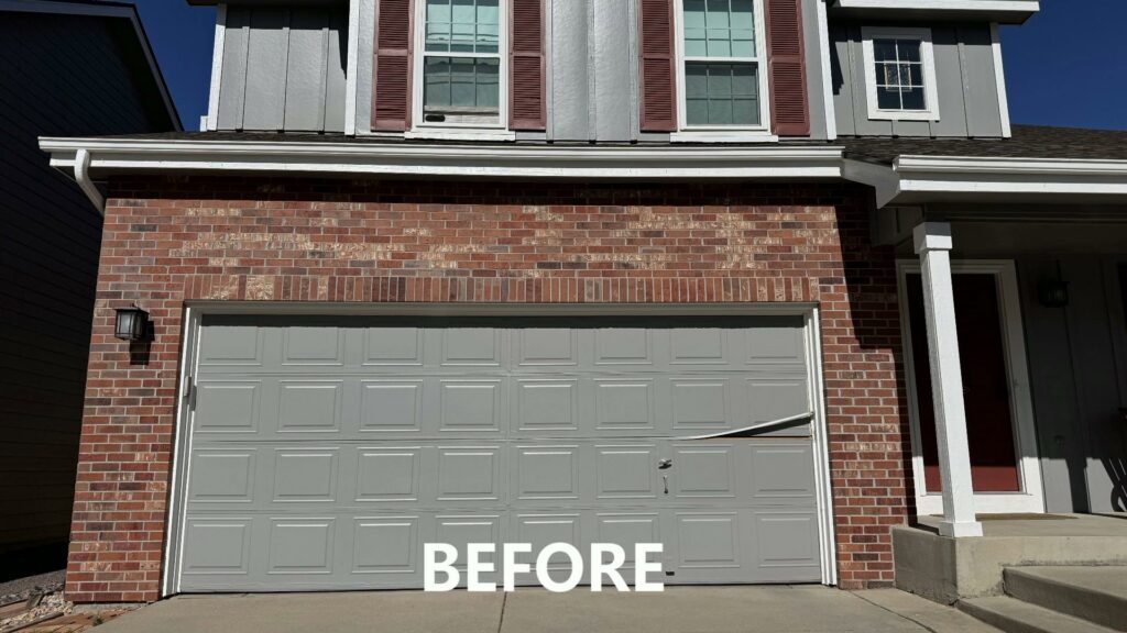 A damaged garage door before repair or replacement by Advanced Door Works in Highlands Ranch, CO
