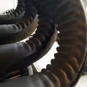 Close-up of damaged insulation on an HVAC pipe, indicating a need for repair by Griffin HVAC in Peoria, IL