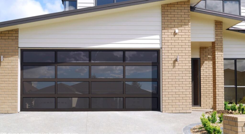 A dark glass modern garage door installed by Revolution Garage Door, LLC in Corvallis, OR.