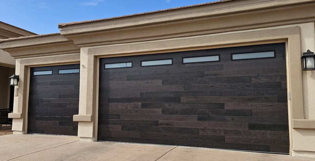 Dark wood-look garage door installation by Smokey's Garage Door Company in Glendale, AZ.