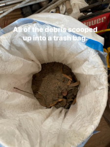 A bag filled with debris and soot removed during a chimney cleaning by Southern Chimney and Duct Clean in Monroe, LA.