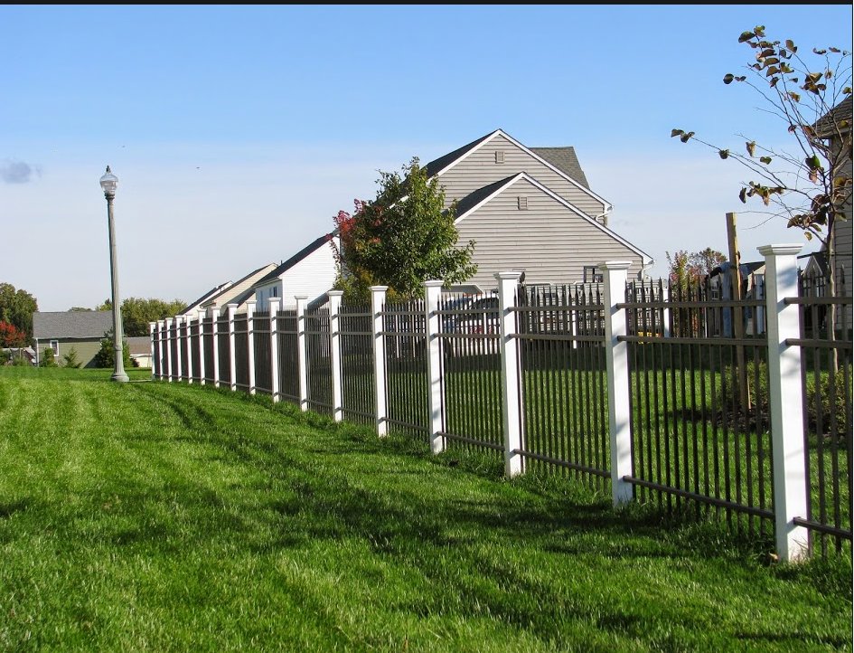 A decorative black and white aluminum fence installed for a residential area by Snyders Custom Fencing in York, PA.