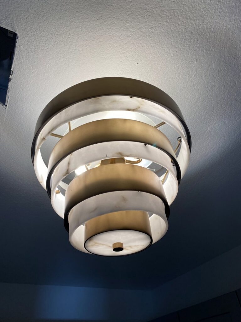 A decorative ceiling light fixture installed by All Electric llc in Denver, CO