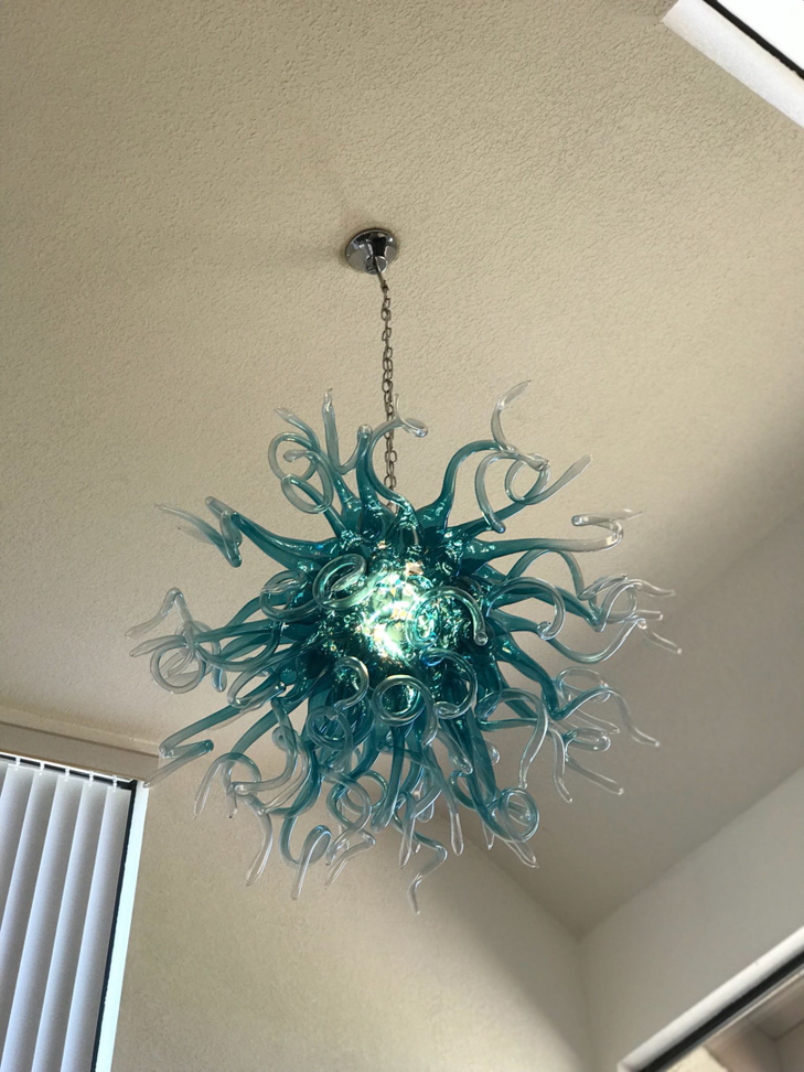 A beautiful decorative glass chandelier professionally installed by Premo Electric in Spring Valley, CA