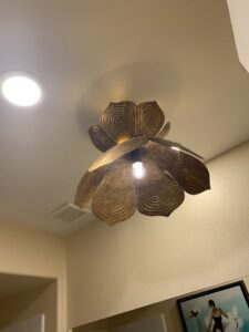 A decorative flower-shaped ceiling light fixture installed by Steve Cavenee Electric in Orange, CA.
