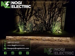Decorative outdoor lighting installation highlighting plants and a wall by Nogi Electric LLC in Mesa, AZ.