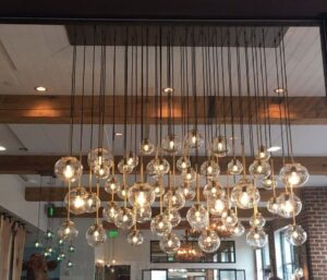 A decorative multi-bulb pendant light fixture installed by Acme Electrical & Ac Services Inc in Tampa, FL.