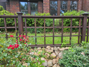 A decorative wooden trellis fence section installed by Fence & Custom Gatework LLC in Columbia, SC