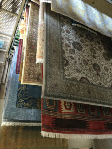 Deluxe Dye Works service van, ready for rug pickup and delivery services in San Jose, CA.