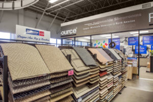 A display of designer area rugs and broadloom carpet samples at ProSource of Stamford in Stamford, CT.
