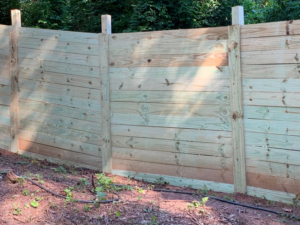 A detailed view of a newly installed horizontal wooden privacy fence by ETJ Fence and Restoration, INC. in Atlanta, GA.