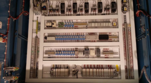 A detailed view of neatly organized wiring and components inside an electrical control panel by D-America Electrical Contractor LLC in Passaic, NJ.