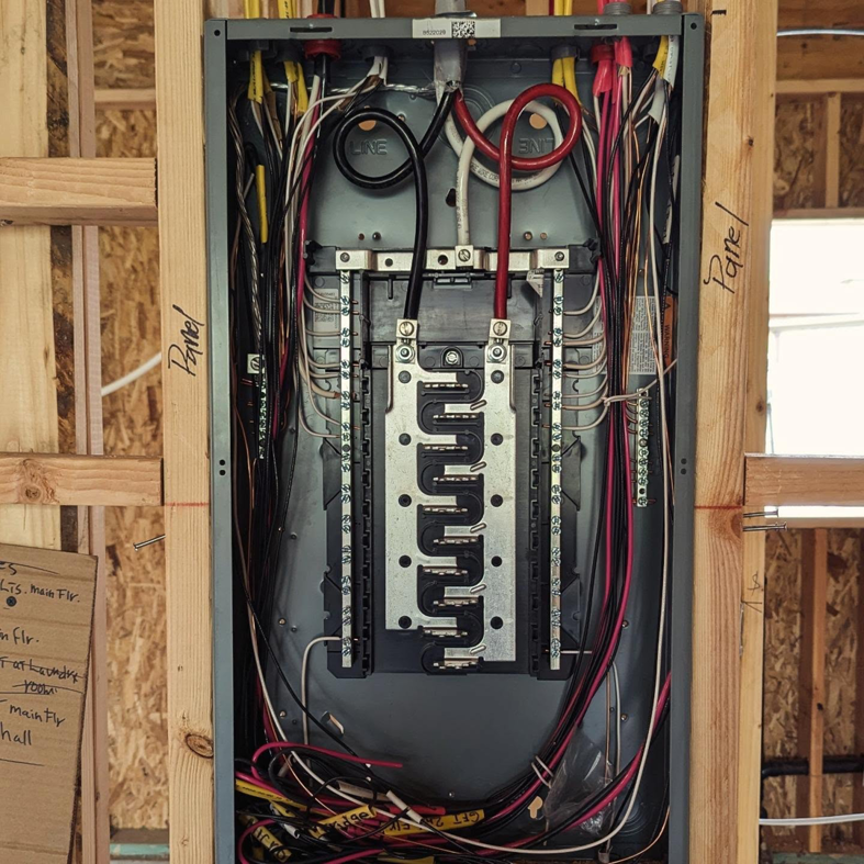 A close-up view of a neatly wired electrical panel with breakers installed by Lara Electric in Miami, FL.