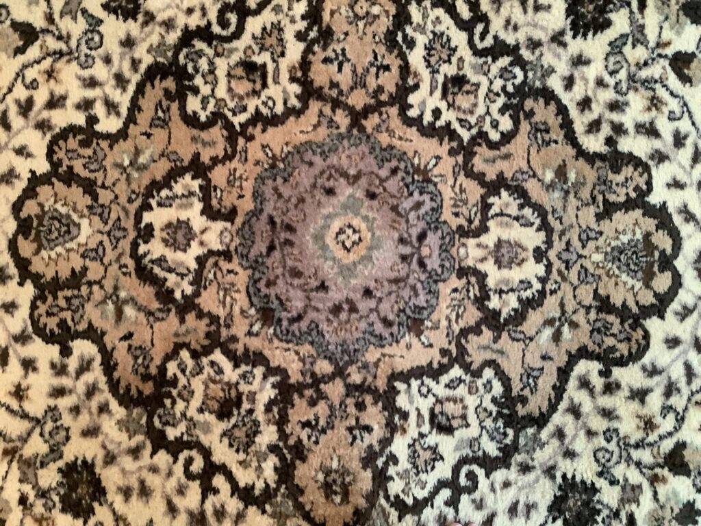 A close-up view of the intricate pattern on an oriental rug, demonstrating the quality of rugs handled by Carpet & Rug Cleaning in Mount Pleasant, SC.