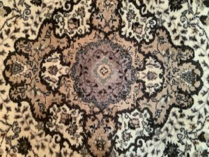 A close-up view of the intricate pattern on an oriental rug, demonstrating the quality of rugs handled by Carpet & Rug Cleaning in Mount Pleasant, SC.