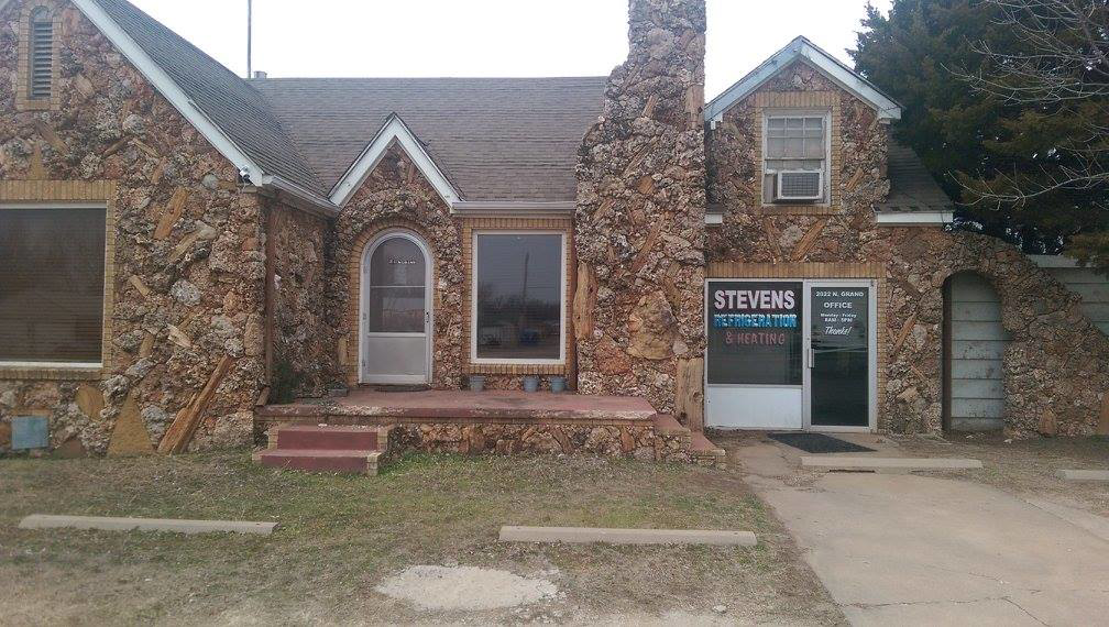 A digital smart thermostat displaying temperature settings, installed by Stevens Refrigeration & Heating in Enid, OK