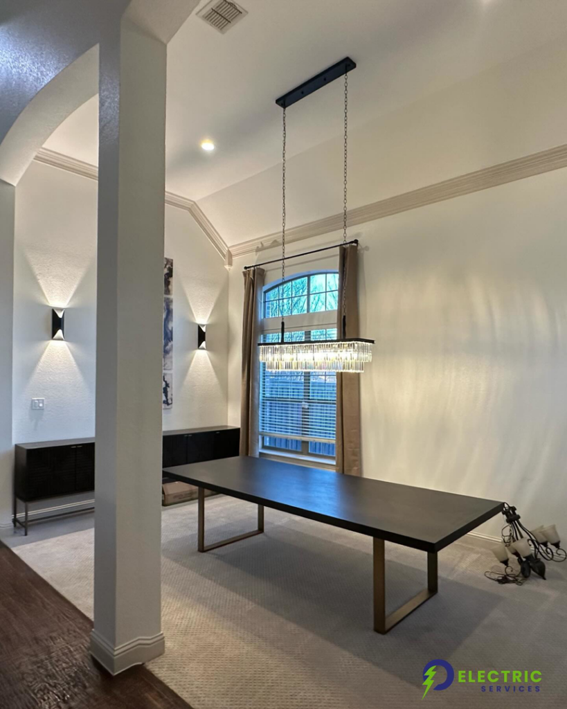 A modern dining room featuring a newly installed chandelier and wall sconces by O Electric Services in Dallas, TX.