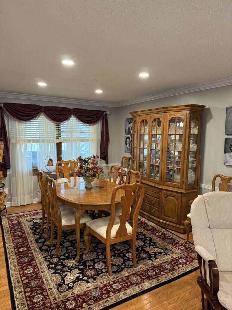Dining room with new recessed lighting installed by Power'd Up Electric, LLC in Clinton, TN.