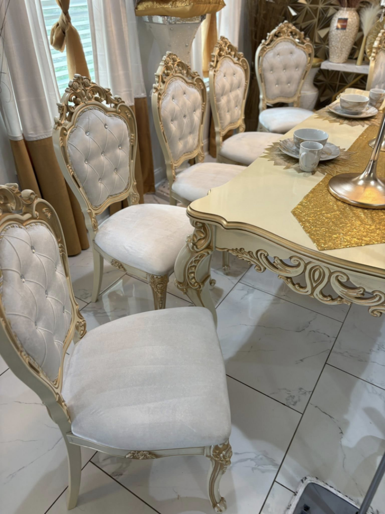 A dining room with multiple upholstered chairs receiving cleaning service from White Diamond Carpet Cleaners in Baton Rouge, LA.