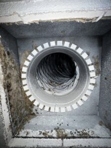 A view inside a dirty air duct, showing the need for air system cleaning by Cunningham's Air Systems in Pearl City, HI