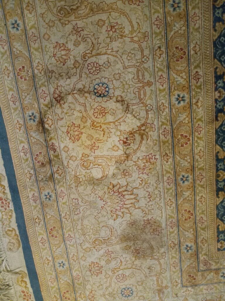 A close-up view of a dirty area rug, ready for professional cleaning by Carpets Dirty in Phoenix, AZ