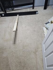 A dirty bedroom carpet with stains before professional cleaning by CitruSolution Carpet & Upholstery Cleaning of Orlando, FL