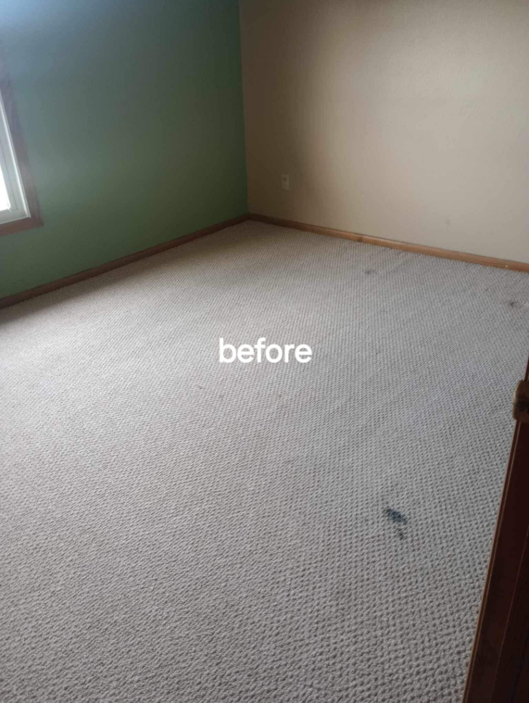 A dirty bedroom carpet with a visible stain before professional cleaning service by B&L Steam Clean & Water Extraction LLC in Columbia, MO