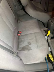Dirty car seats with visible stains, demonstrating the need for professional auto upholstery cleaning by Steam Choice Carpet Care Inc in Chicago, IL.