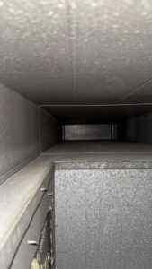 A visibly dirty carpet with multiple stains, captured before professional cleaning by Zerorez ChicagoLand in Naperville, IL.