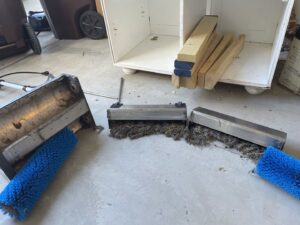 Heavily soiled carpet cleaning brush heads after a job by Tailor Maid Carpet Cleaning in Colorado Springs, CO.