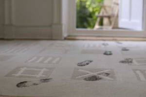 Dirty carpet with patterns and footprints, for Pro-line Professional Upholstery & Carpet Cleaning, Austin, TX.