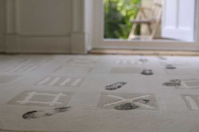 Dirty carpet with patterns and footprints, for Pro-line Professional Upholstery & Carpet Cleaning, Austin, TX.