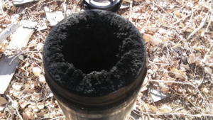 A heavily soiled chimney flue with significant creosote buildup, showing the need for sweeping by Jesse Montero in Yerington, NV.