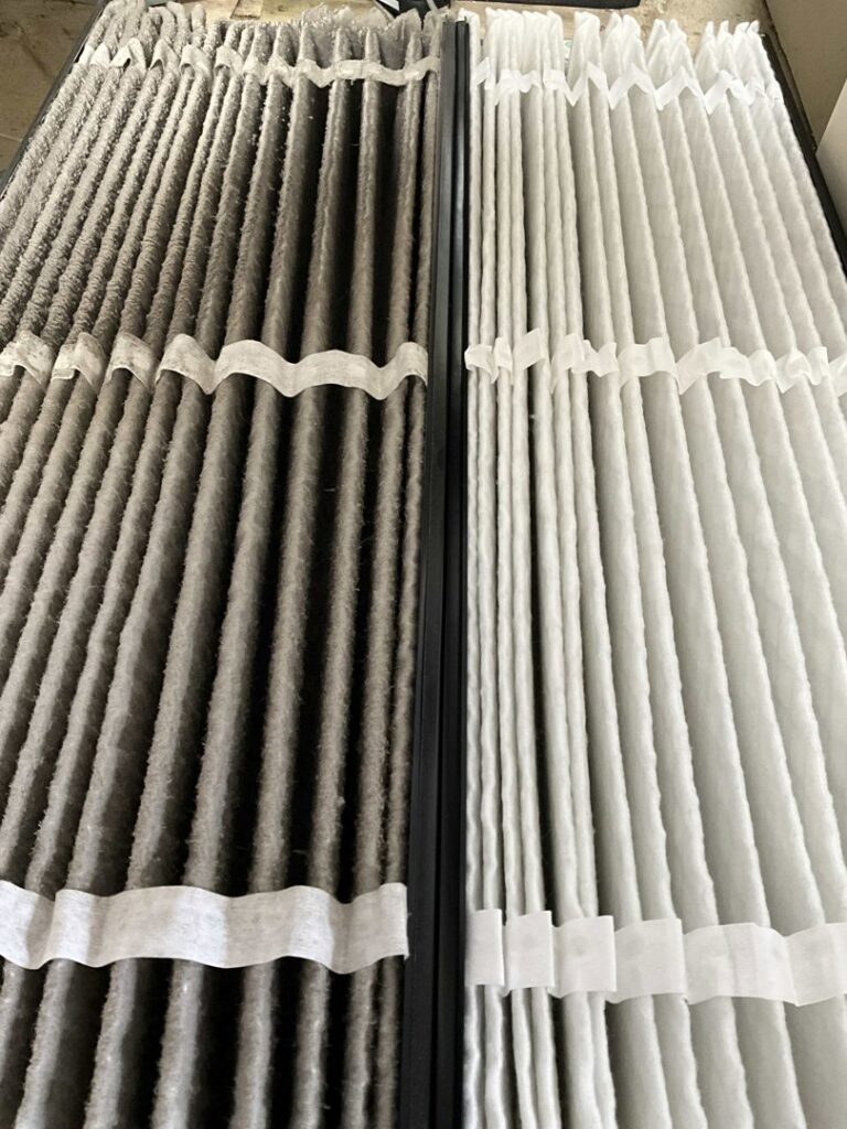 A side-by-side comparison of a dirty air filter next to a clean one, demonstrating air quality service by Supertech Home Services in Warren, MI.