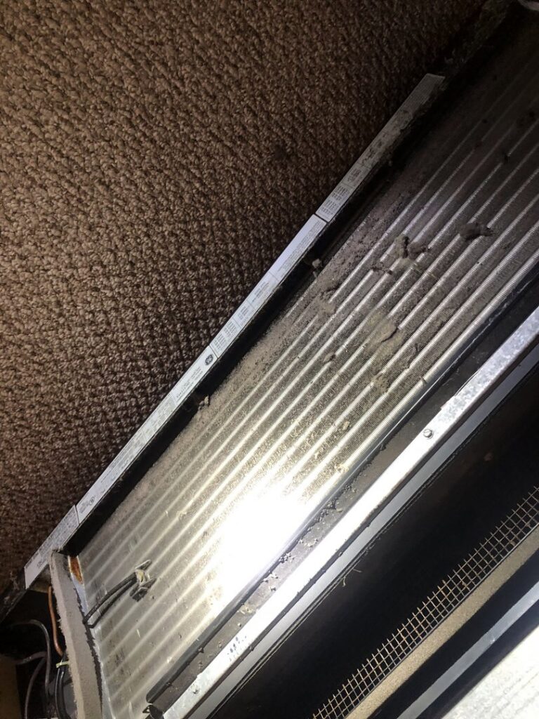 A dirty evaporator or condenser coil requiring HVAC service from Ohio City Heating and Cooling in Cleveland, OH.