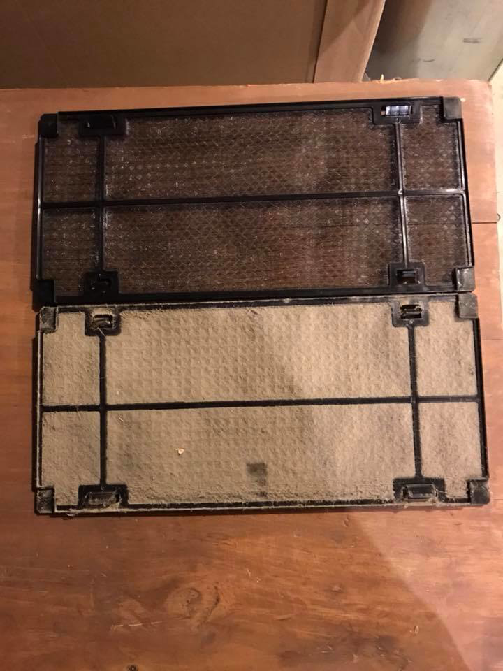 Two extremely dirty heat pump air filters, ready for cleaning or replacement by Winks Heat Pump Cleanings in Bangor, ME